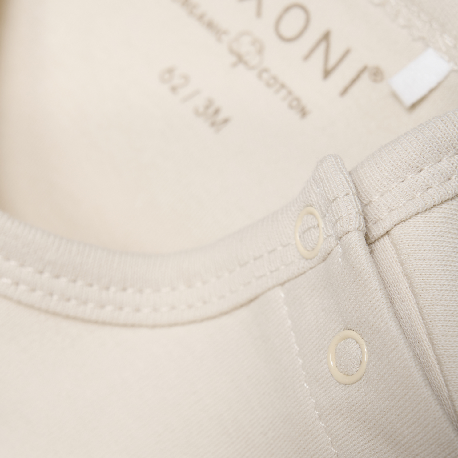 Fixoni Baby Body i økologisk bomuld - Oatmeal