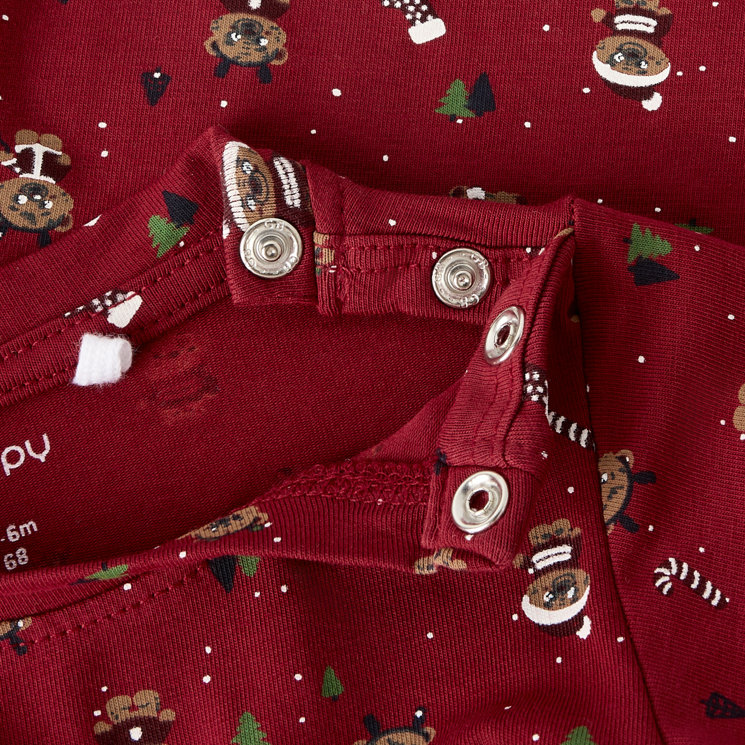 Guppy Jule Baby Body - Rhythmic Red